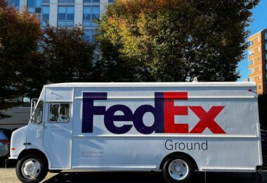 parked fedex van on the asphalt road